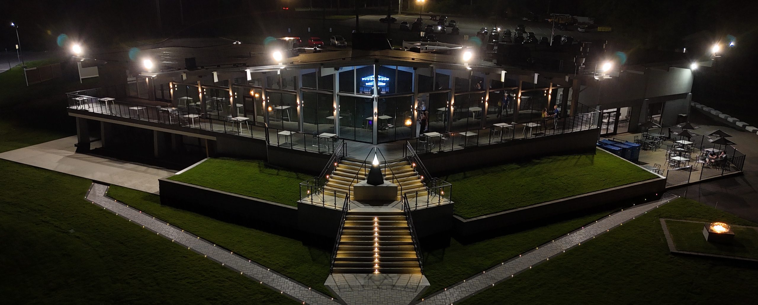 The VUE clubhouse and terrace lit up at night, home of 500 Wine Bar in Hamden, CT