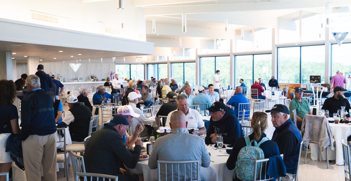 Guests gathered at tables for a charity fundraiser luncheon in The VUE ballroom