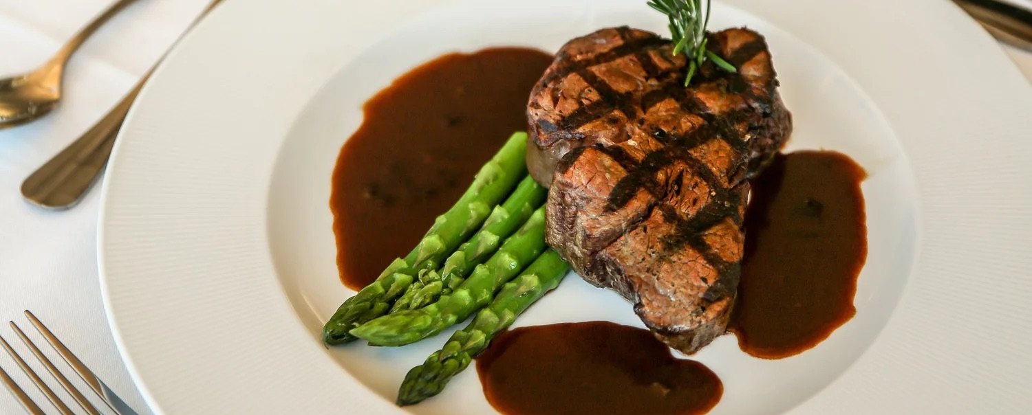 Grilled filet mignon with asparagus and red wine demi-glace at Nineteen at The VUE in Hamden, CT