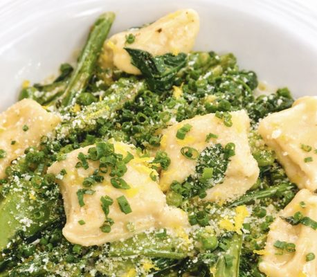 Ravioli tossed with asparagus, spring greens, lemon zest and parmesan at Nineteen